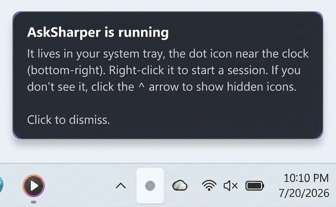 A Windows notification in the lower-right of the desktop: "AskSharper is running — it lives in your system tray, the dot icon near the clock. Right-click it to start a session."